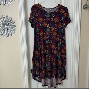 LuLaRoe Carly swing dress in a multicolor geometric print purple high lowSize S